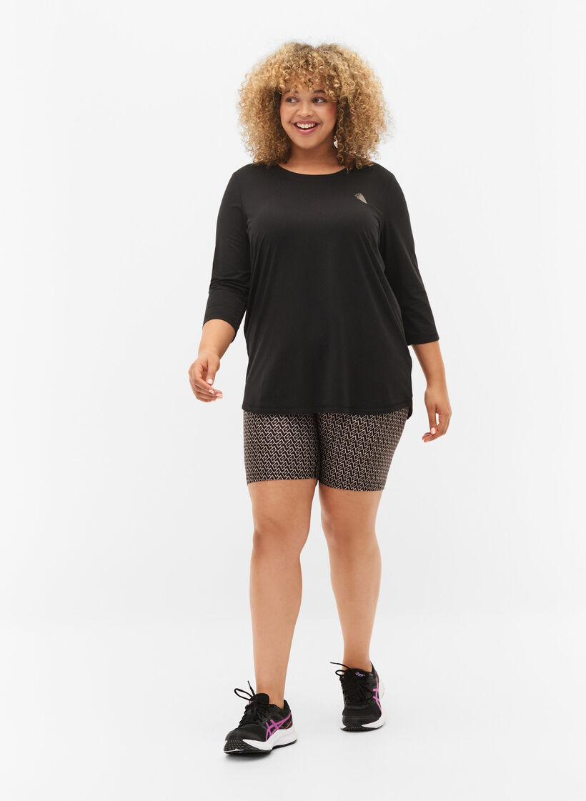 Koszulka do cwiczen z rekawami 3/4, Czarne, Model image number 1