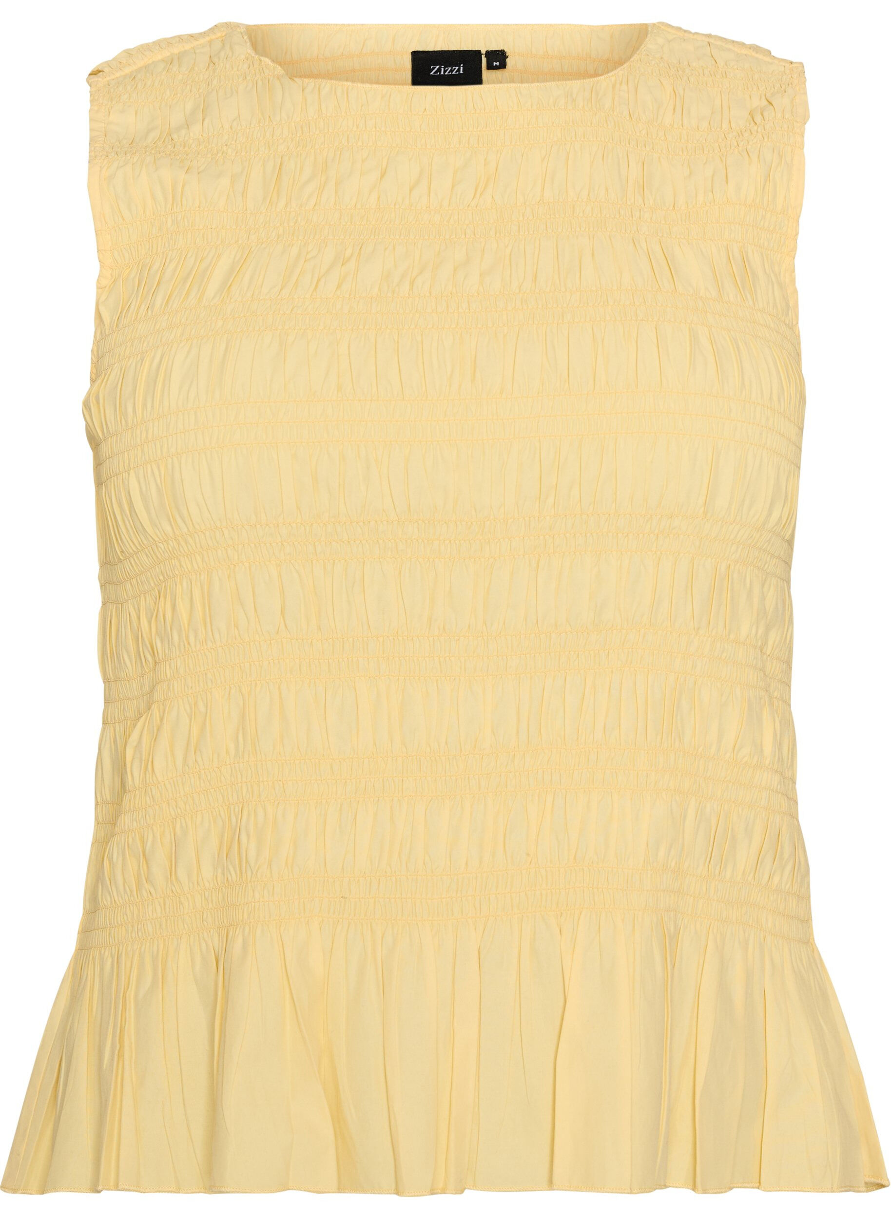 Bluzka z kolnierzykiem w ksztalcie l&oacute;dki i peplumowym wycieciem na dole