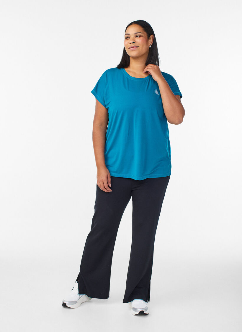 Koszulka treningowa w jednolitym kolorze, Zielony, Model image number 1