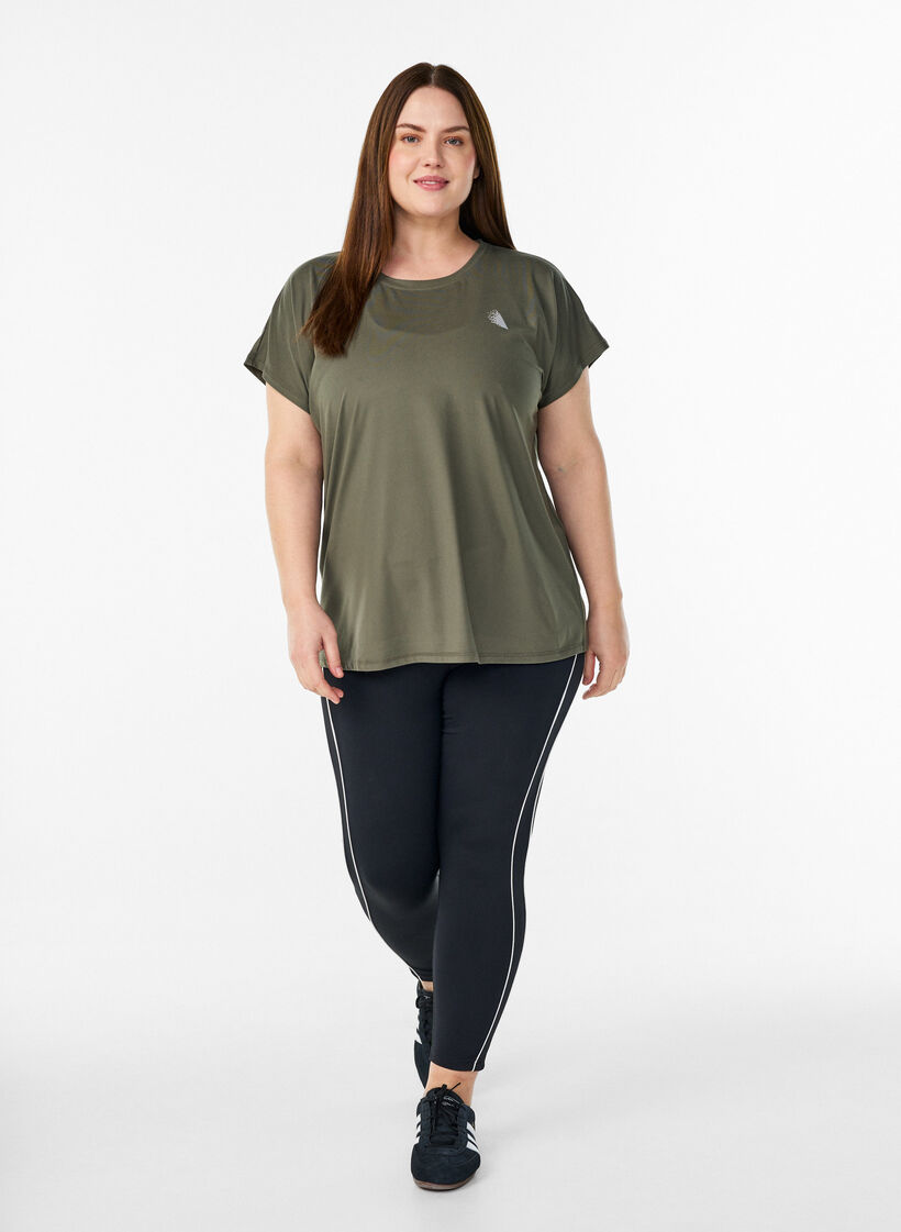 Koszulka treningowa w jednolitym kolorze, Zielony, Model image number 1