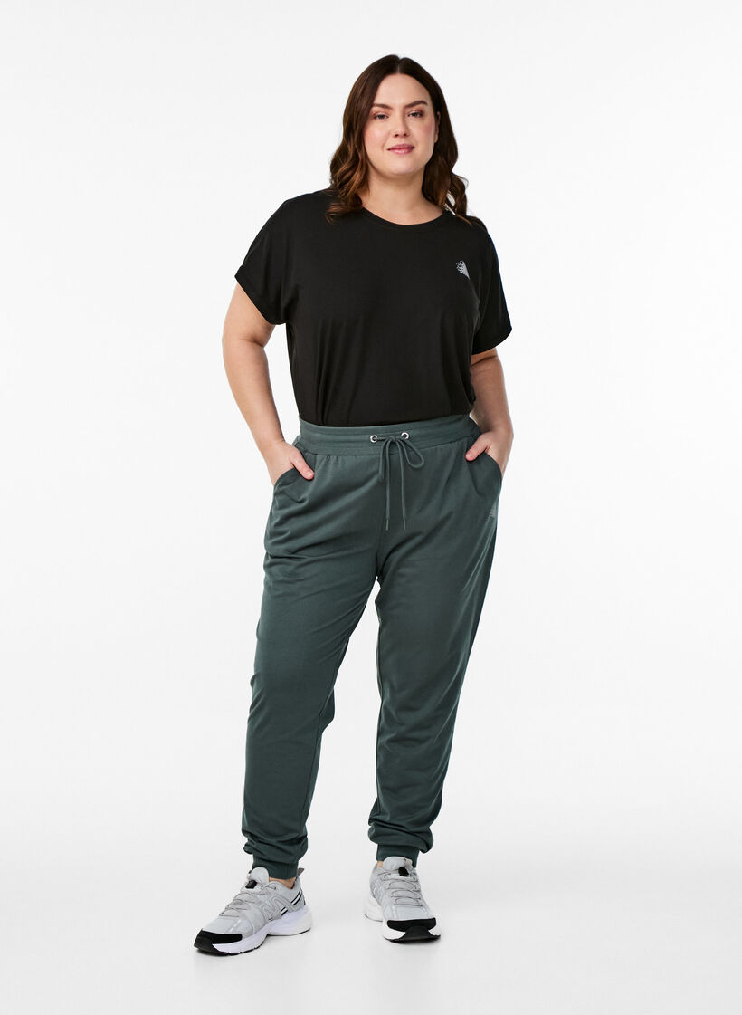 Luzne spodnie dresowe z kieszeniami, Zielony, Model image number 0