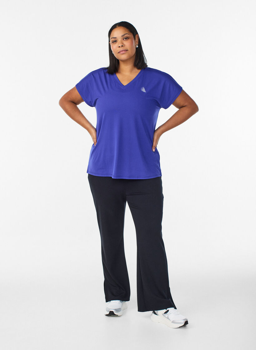 Luzna koszulka treningowa z dekoltem w szpic, Fioletowy, Model image number 1