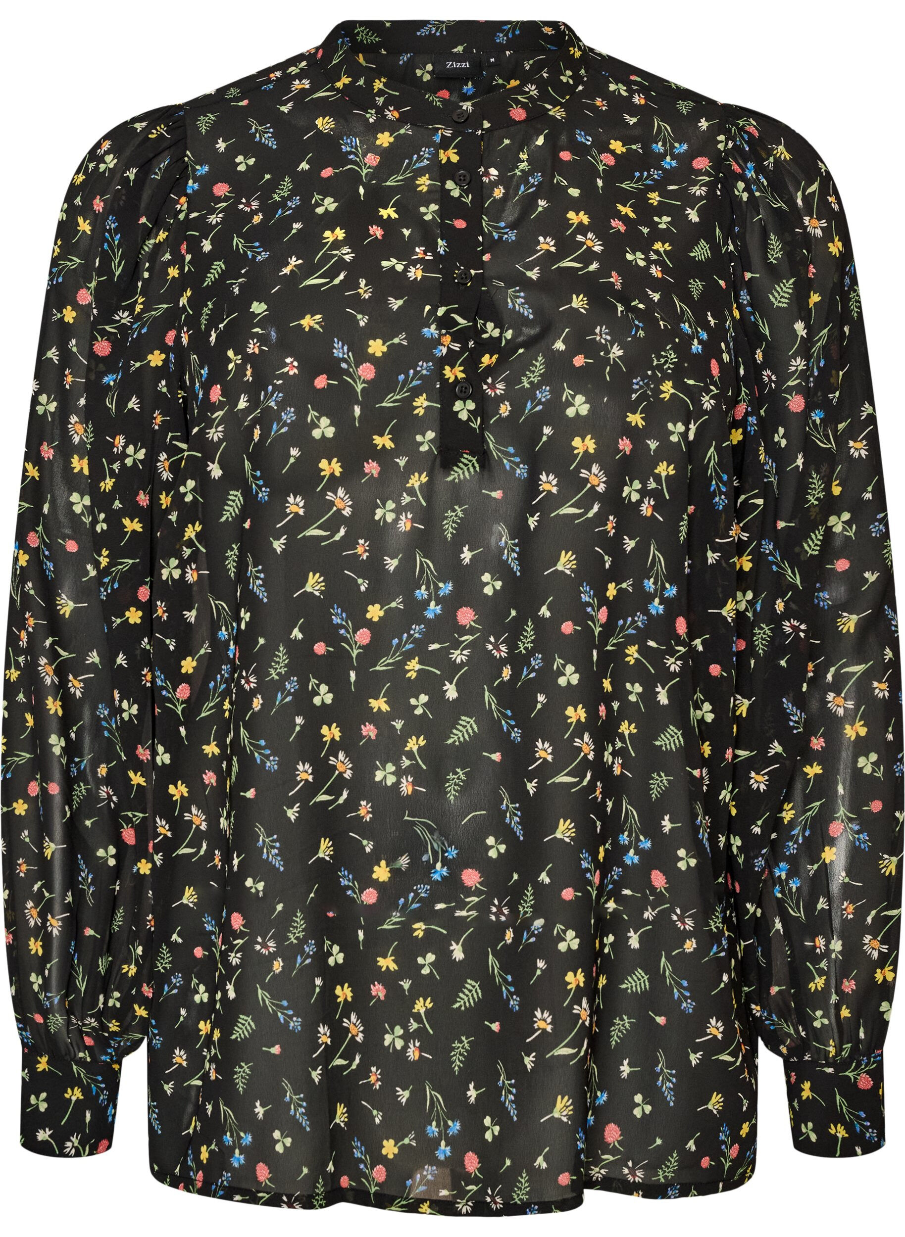 Bluzka z nadrukiem na calej powierzchni i kr&oacute;tka plisa z guzikami