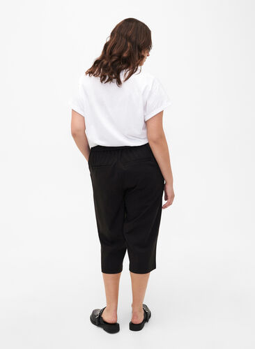 Maddison luzne spodnie 3/4 z kieszeniami, Black, Model image number 1