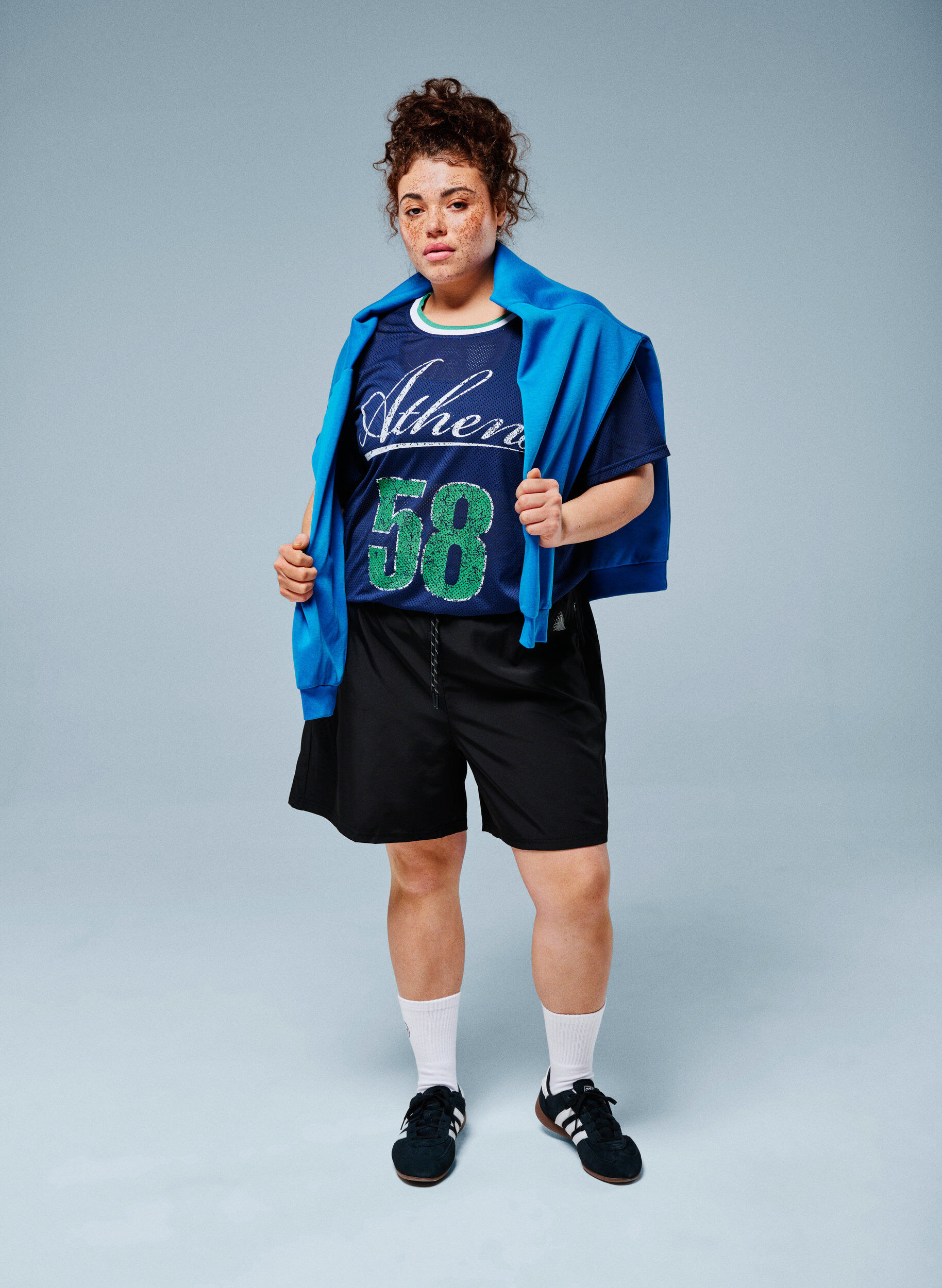 Szorty sportowe z wewnetrznymi szorty i kieszenia na telefon