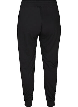 Luzne spodnie treningowe z kieszeniami, Black, Packshot image number 1