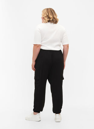 Jednolite spodnie bojówki z duzymi kieszeniami, Black, Model image number 1