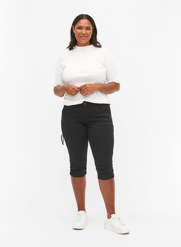 Waskie jeansy capri z kieszeniami, Black, Model image number 0