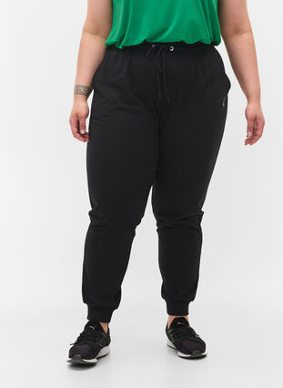 Luzne spodnie treningowe z kieszeniami, Black, Model image number 2