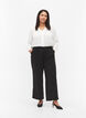 Flared trousers with pockets, Black, Model image number 0