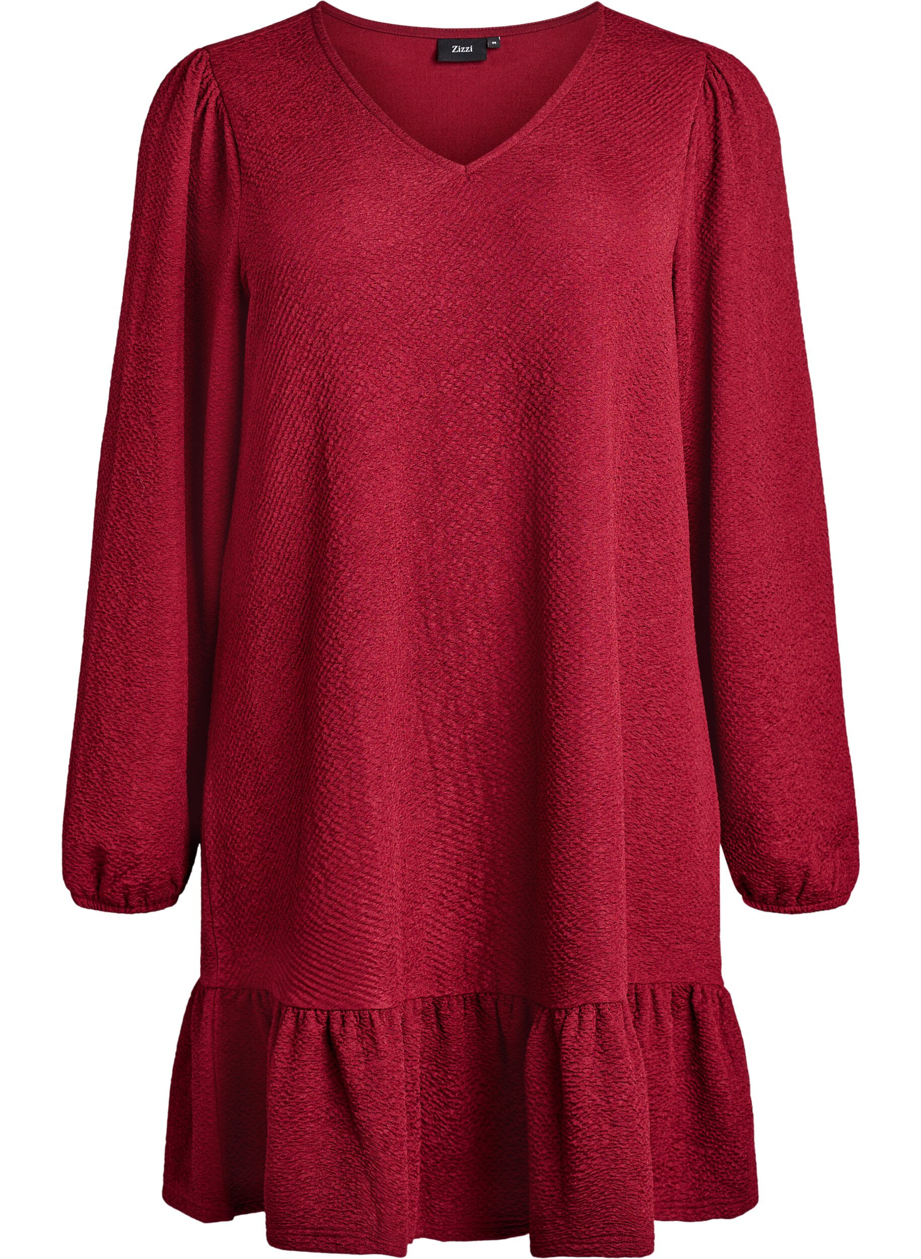 Kr&oacute;tka teksturowana sukienka z falbana u dolu