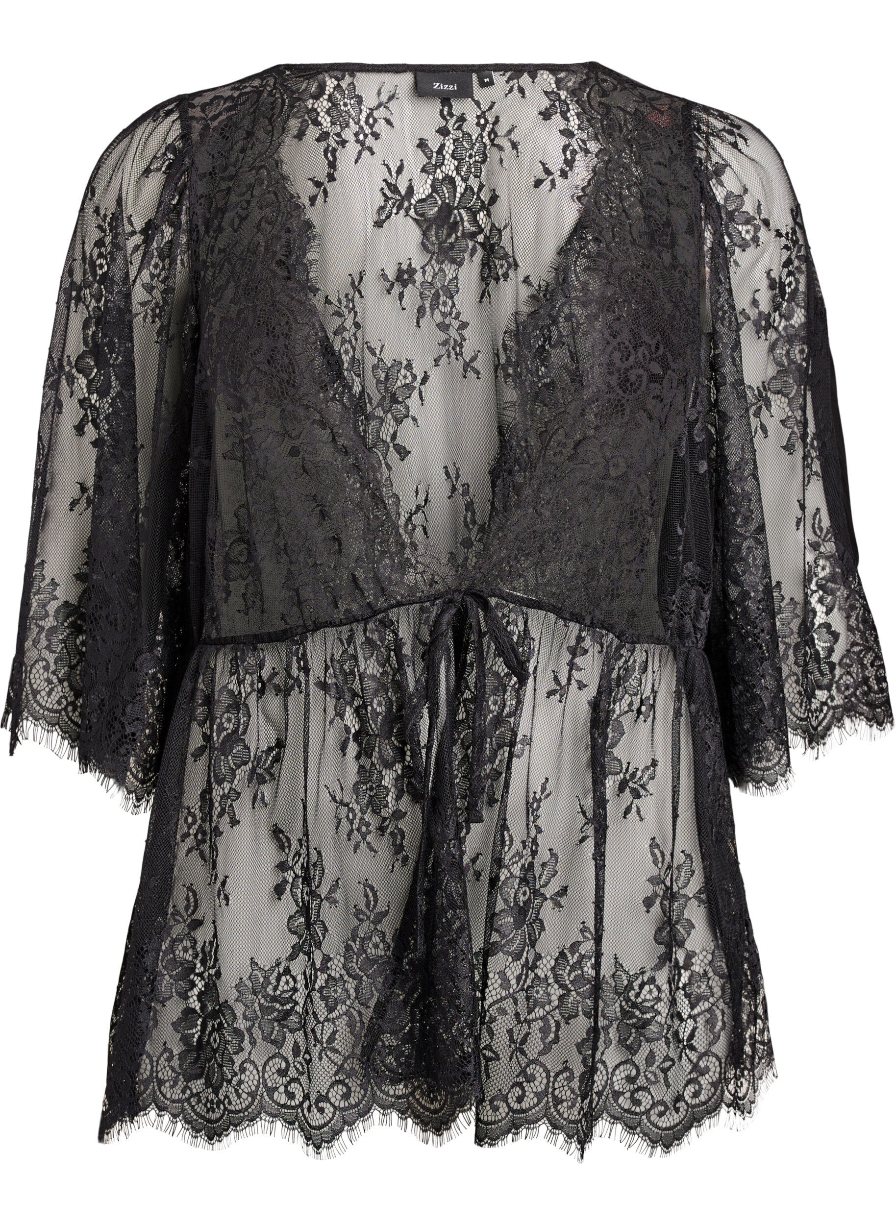 Bluzka koronkowa z kokardka i rekawami 3/4