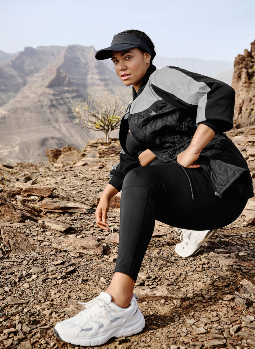 Odblaskowa sportowa kurtka z regulacja w pasie, Black w. Reflex, Image image number 0