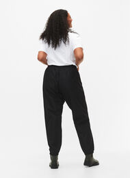 Spodnie przeciwdeszczowe z gumka i sznurkiem, Black, Model