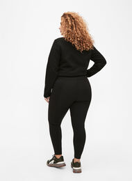 Elastyczne i wytrzymale legginsy do cwiczen z kieszeniami, Black, Model