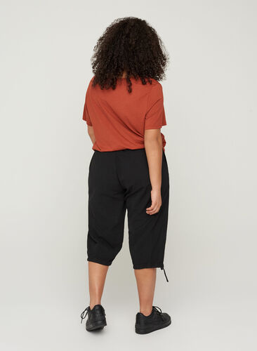 Bawelniane spodnie o luznym kroju, Black, Model image number 1