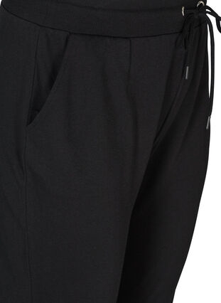 Luzne spodnie treningowe z kieszeniami, Black, Packshot image number 2