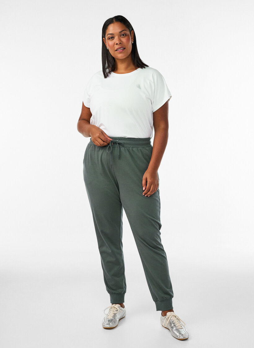 Luzne spodnie dresowe z kieszeniami, Zielony, Model image number 0