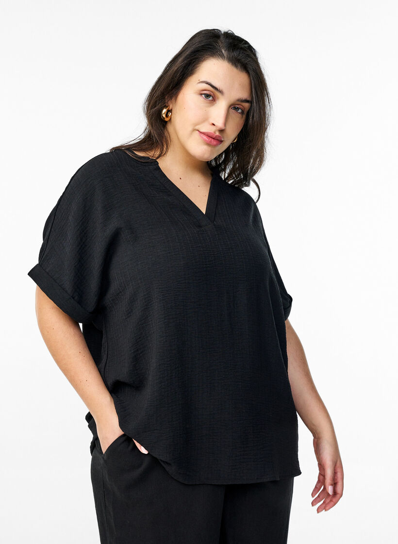Luzna bluzka z kr&oacute;tkim rekawem, Czarne, Model image number 0