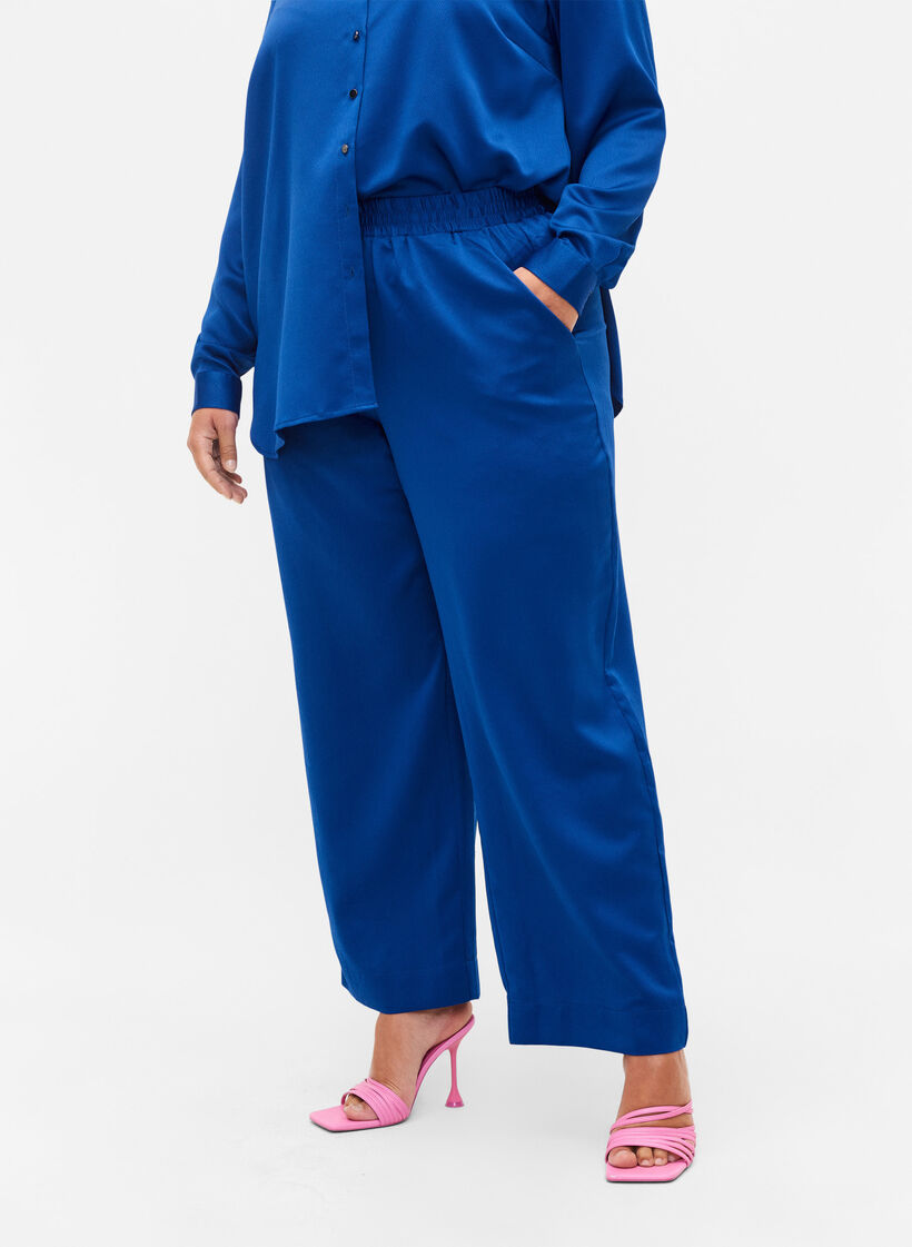 Loose fitting trousers with light shine and width, Surf the web, Model image number 1