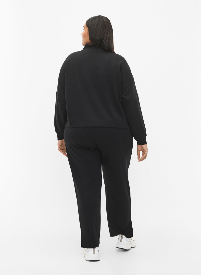 Spodnie z mieszanki modalu z rozcieciem, Black, Model image number 1