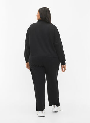 Spodnie z mieszanki modalu z rozcieciem, Black, Model image number 1