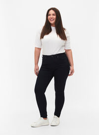 Super waskie jeansy Amy z wysokim stanem, Unwashed, Model